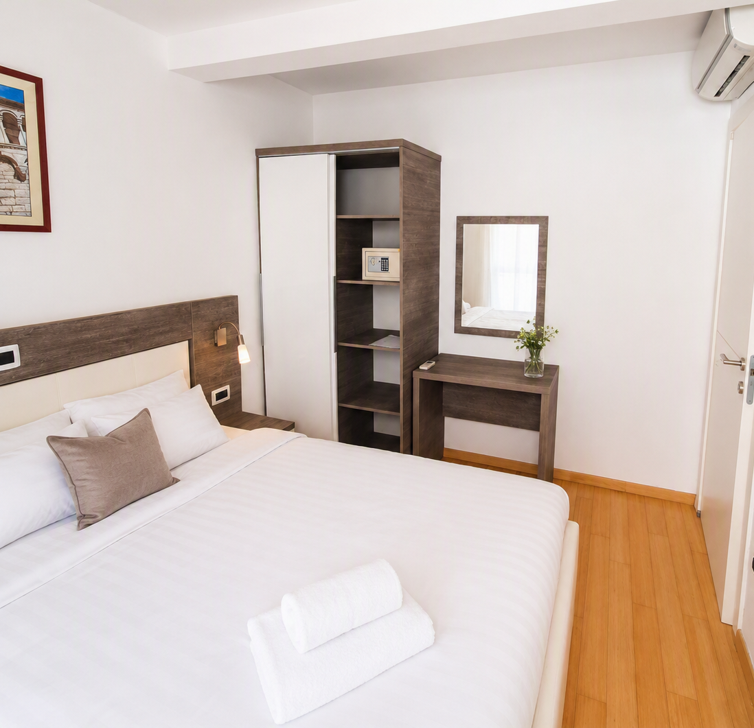 Samostatná ložnice dvoupokojového apartmánu v Petrčane